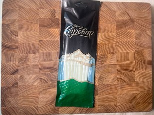 Сыр копченый на ольхе с перцем 